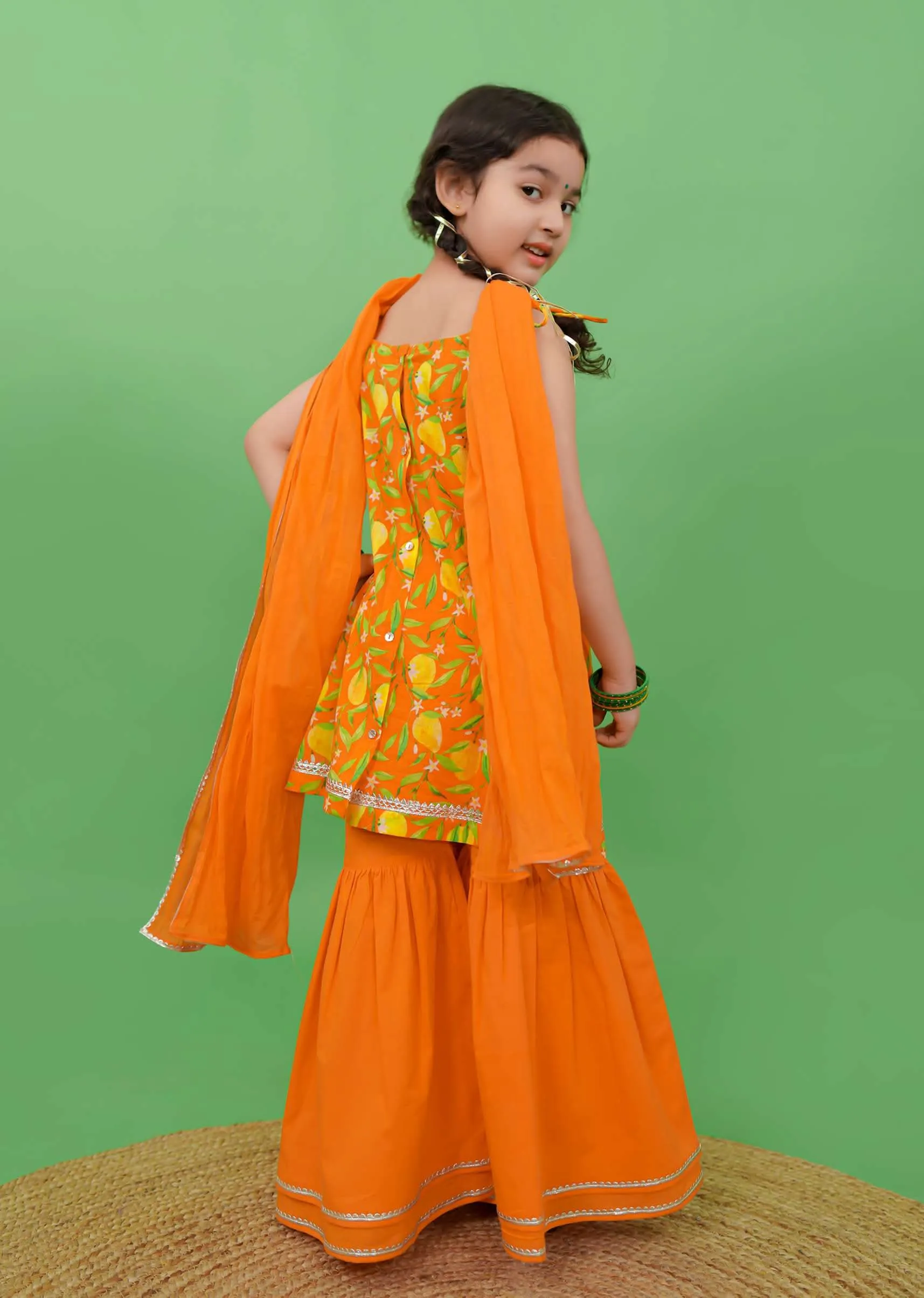 Kalki Girls Orange Sharara Suit In Cotton With A Straight Cut Mango Print Strappy Kurti By Tiber Taber